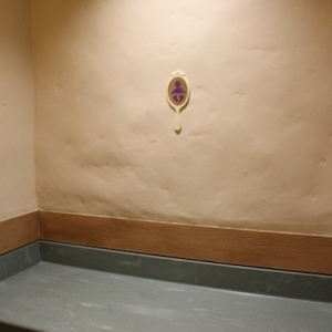 Tangled rest area - changing table in women's restroom