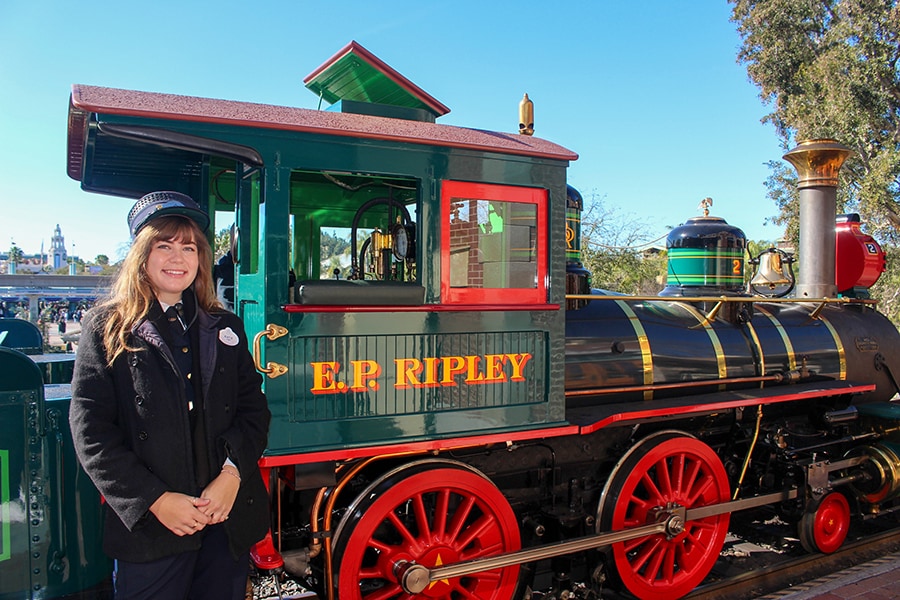 Katie Wildrick standing in front of the E.P. Ripley engine